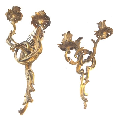 Appraisal: A pair of ormolu two branch wall appliques of Rococo