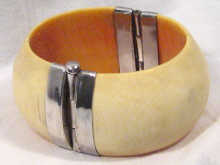 Appraisal: A silver and ivory bangle circa