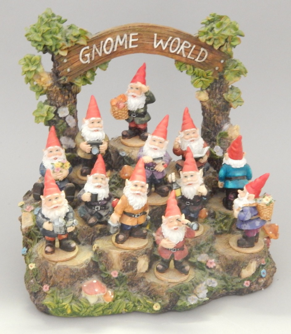 Appraisal: A modern group of garden gnomes on a painted plastic