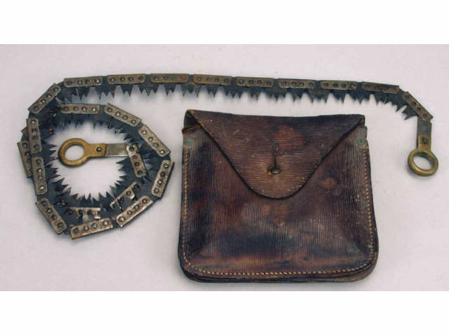 Appraisal: Folding chain saw in original leather case Estimate -