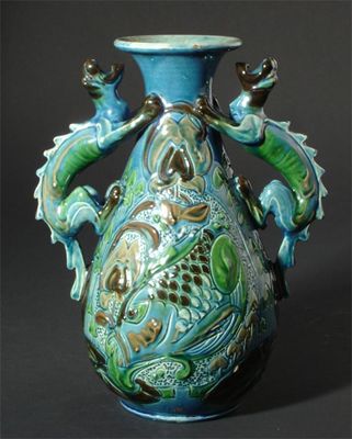 Appraisal: A Brannam Pottery twin-handled vase modelled with reptile handles the