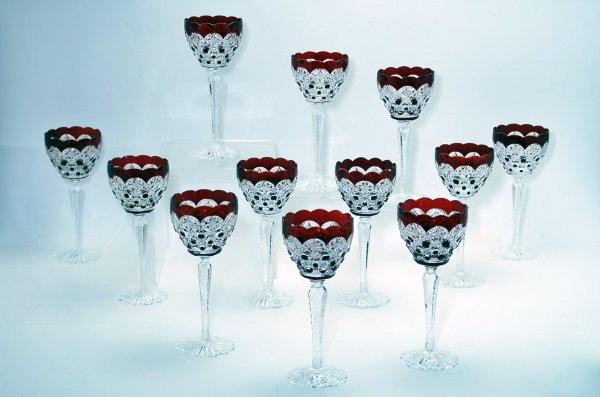 Appraisal: Set of twelve ruby cut overlay wine stems with scalloped