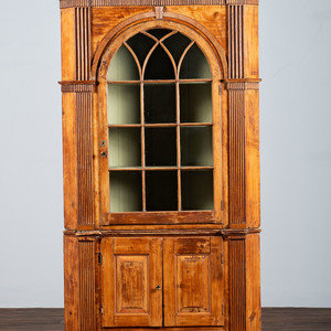 Appraisal: A Chippendale Carved and Stained Pine Corner Cupboard Circa with