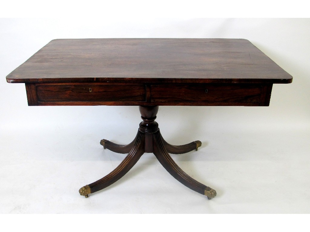 Appraisal: A Regency rosewood library table the rectangular top with rounded