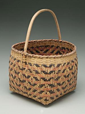 Appraisal: Cherokee river cane basket brown and faded red weavers in