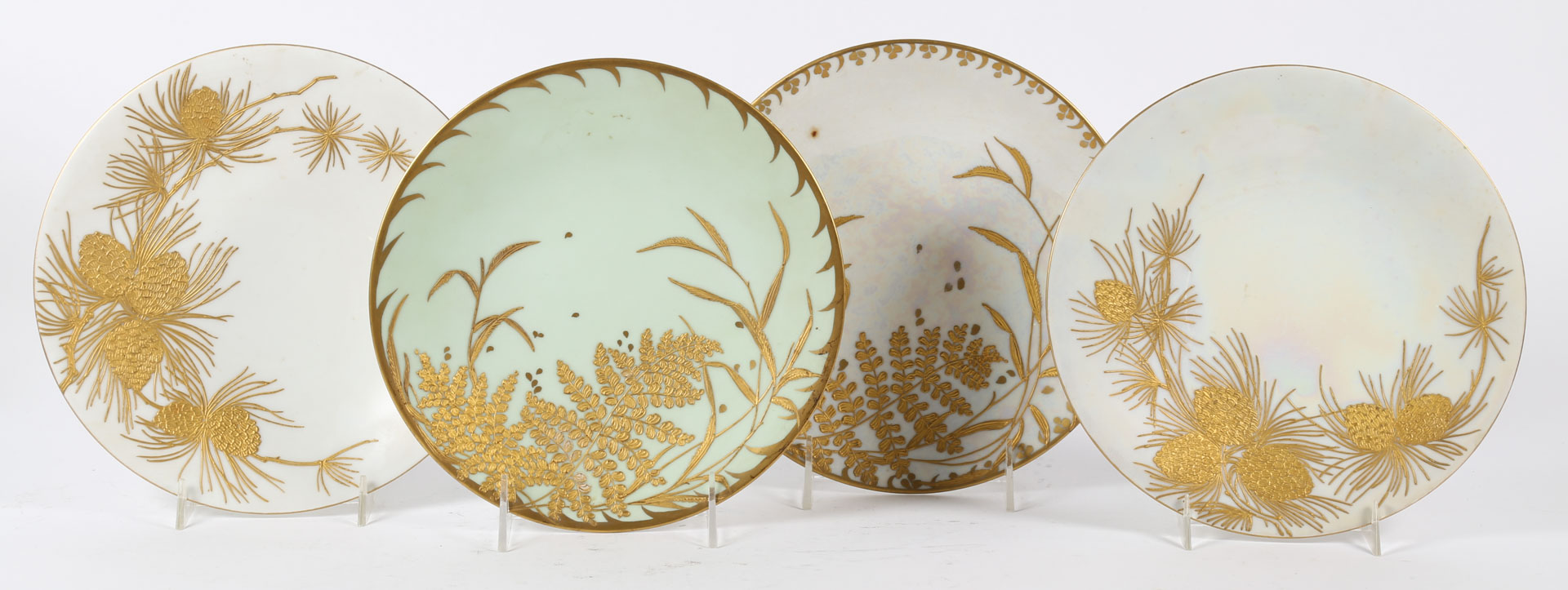 Appraisal: Four Limoges gilt decorated plates Undernumber