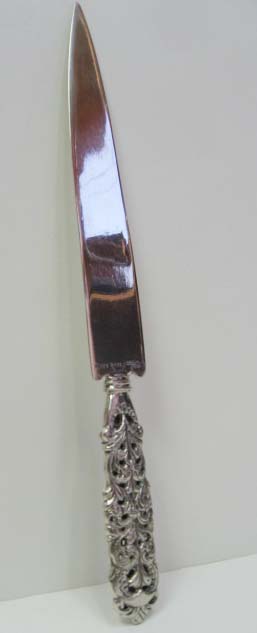 Appraisal: A Peruvian Sterling Paper Knife with a long dagger-form blade