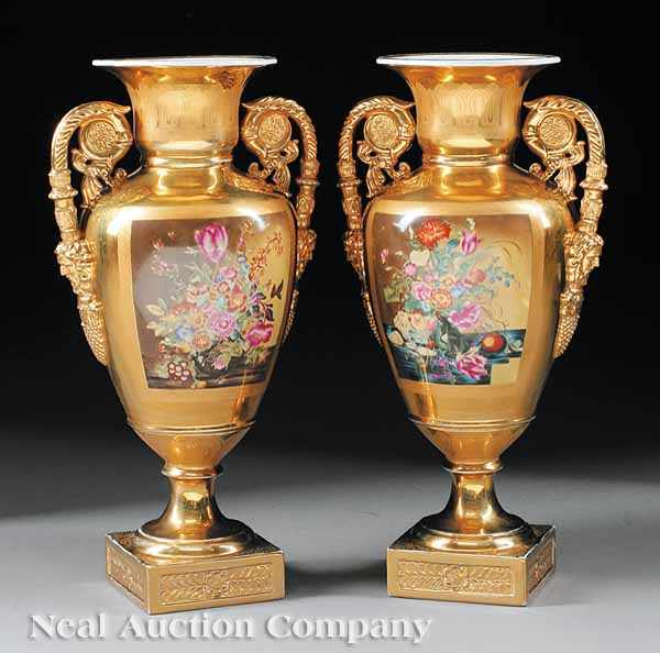 Appraisal: A Pair of Monumental Polychrome and Gilded Porcelain Vases th