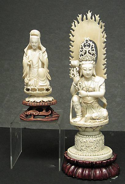 Appraisal: Two carved ivory figures of Guanyin th Century The larger