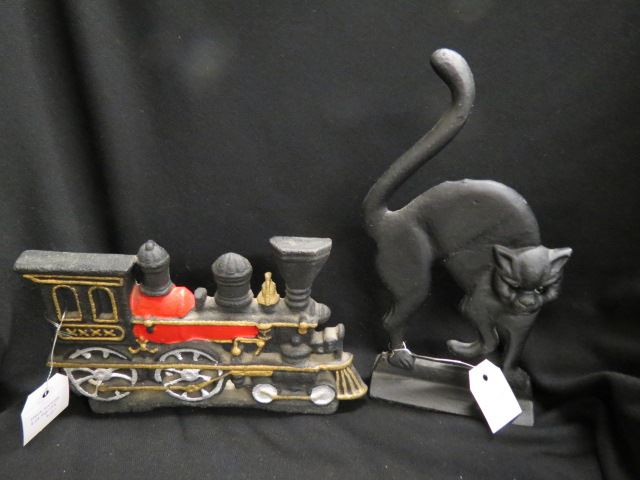 Appraisal: Cast Iron Figural Doorstops cat and locomotive not old