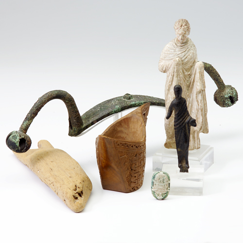 Appraisal: A group of the Antiques Earthenware draped figure on stand