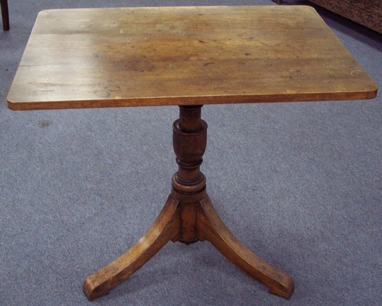 Appraisal: A th Century rectangular table on a turned column and