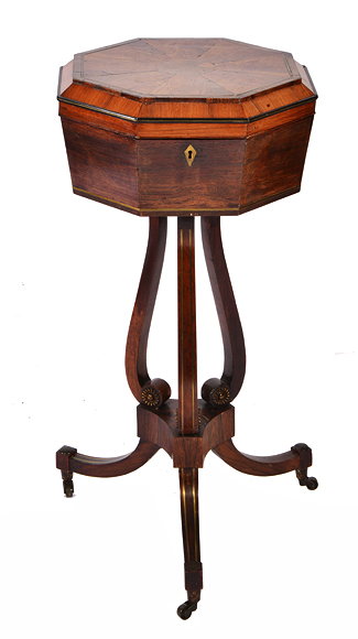 Appraisal: A REGENCY OCTAGONAL MAHOGANY WORKBOX ON STAND the veneered and