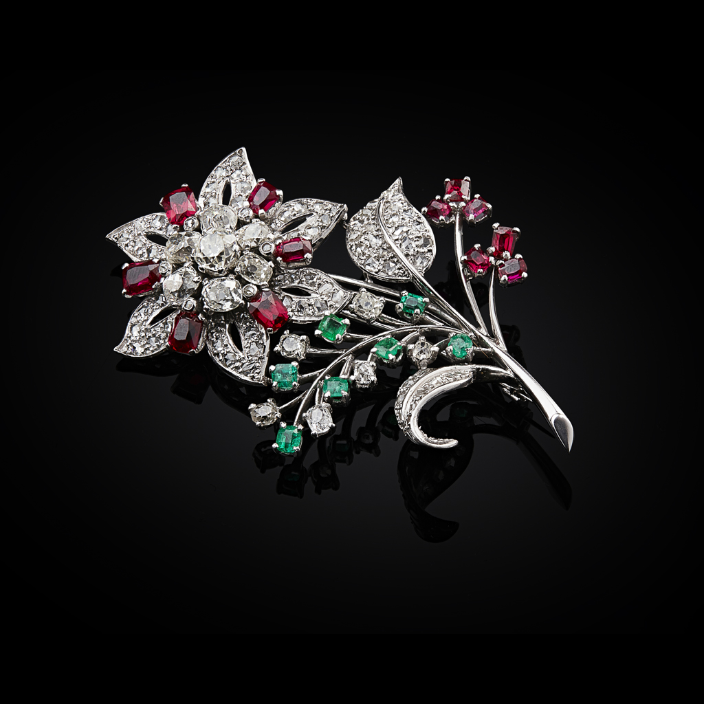 Appraisal: GARRARD CO - A diamond ruby and emerald set floral