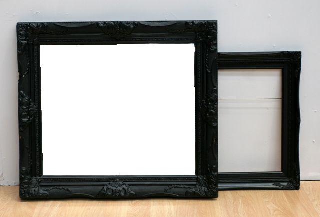 Appraisal: A black painted plaster framed mirror cm high cm wide