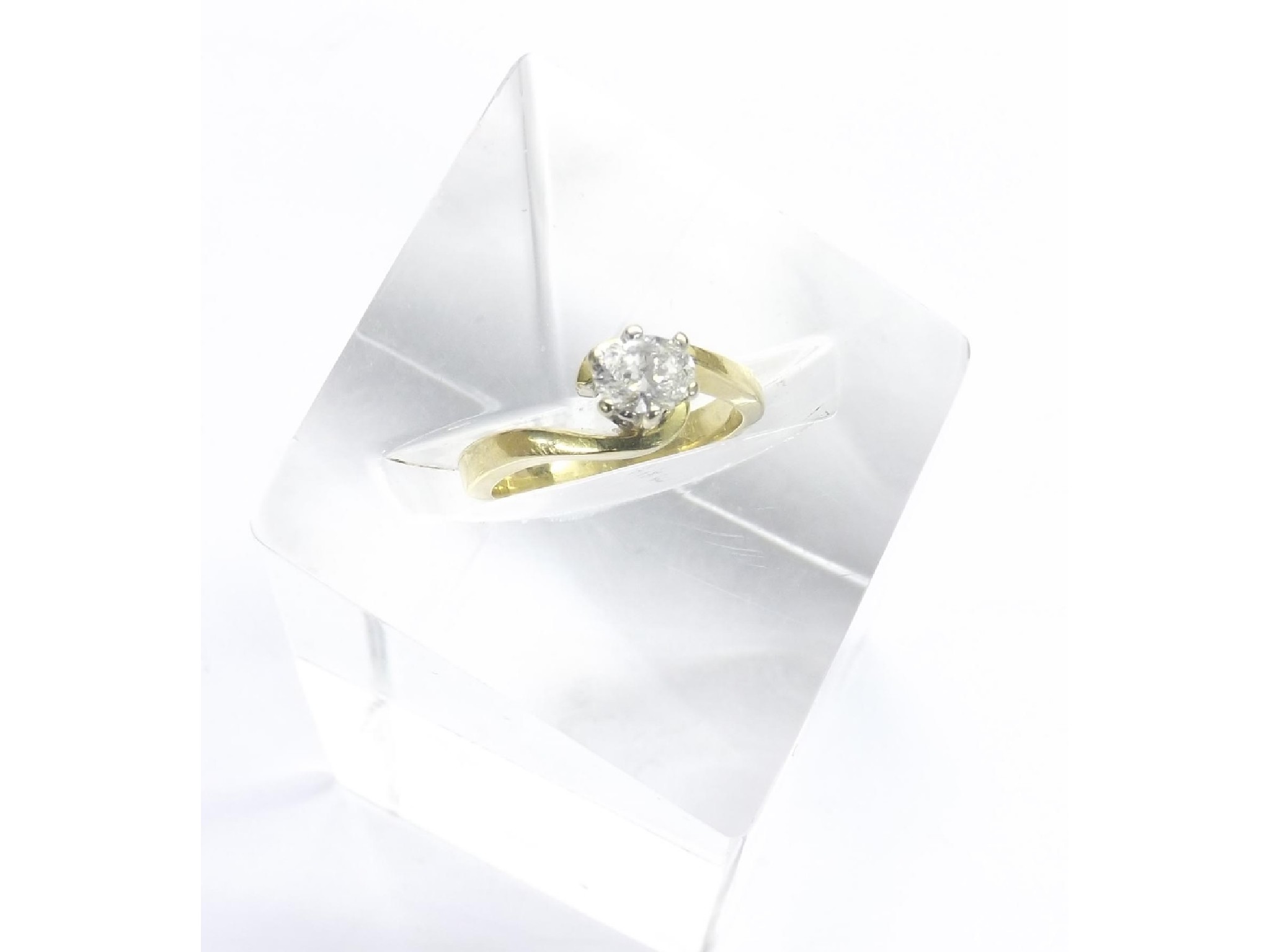 Appraisal: ct oval cut solitaire diamond ring in a crossover setting