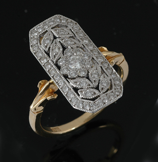 Appraisal: An Art Deco style diamond plaque ring The pierced octagonal