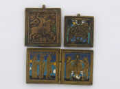 Appraisal: A folding enamelled brass portable icon x cm open and