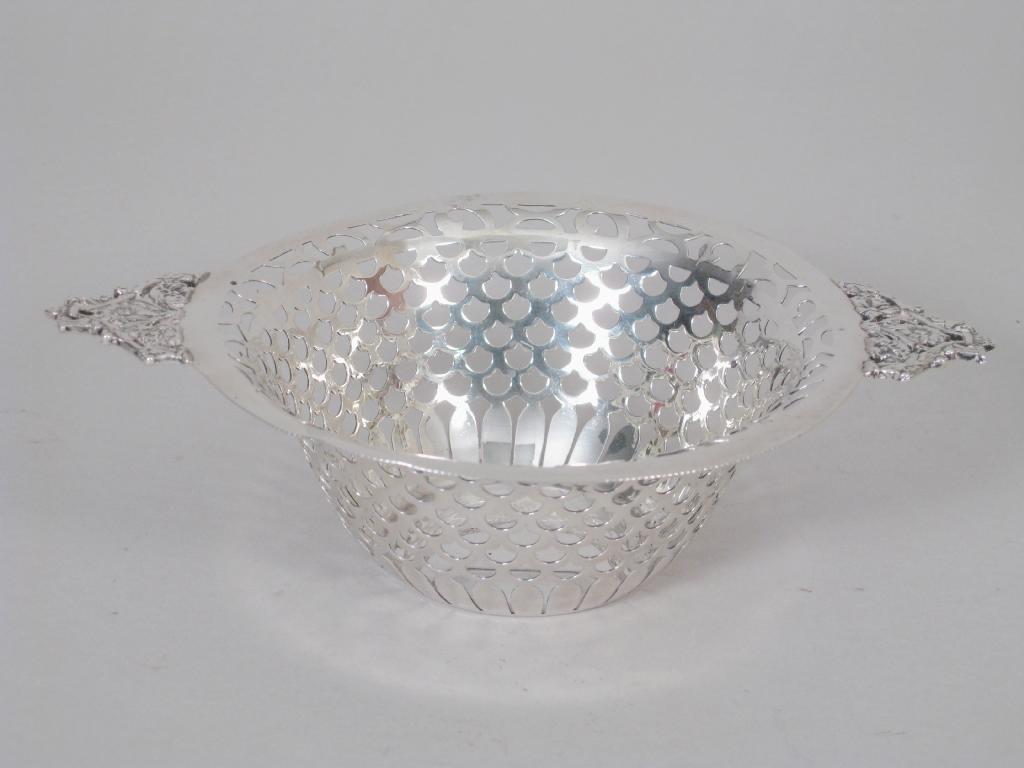 Appraisal: An Edward VII pierced circular two handled Bowl Birmingham in