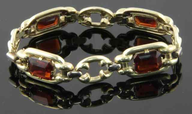 Appraisal: A ct gold gem set bracelet with alternate gem set