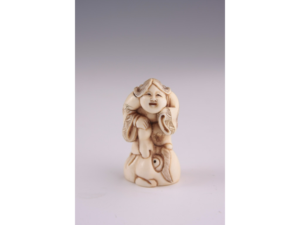 Appraisal: Netsuke Katabori Carved Ivory Figure unusual figure of a woman