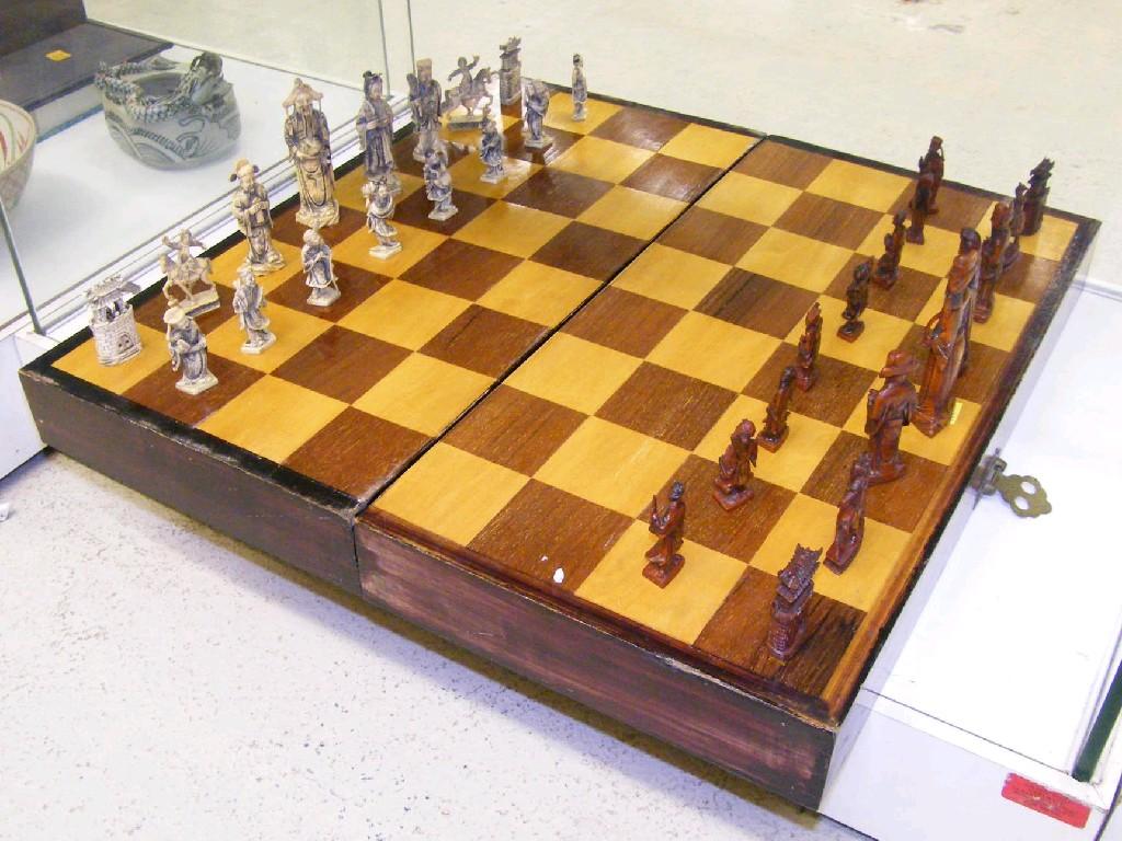 Appraisal: Early th century Japanese chess set with carved ivory and