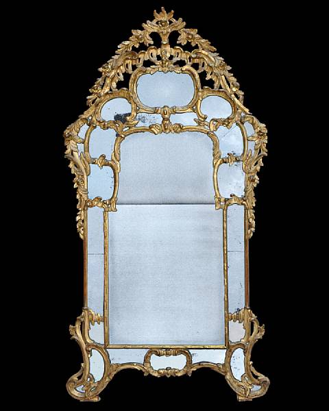 Appraisal: A superb Italian Rococo giltwood mirror probably made for the