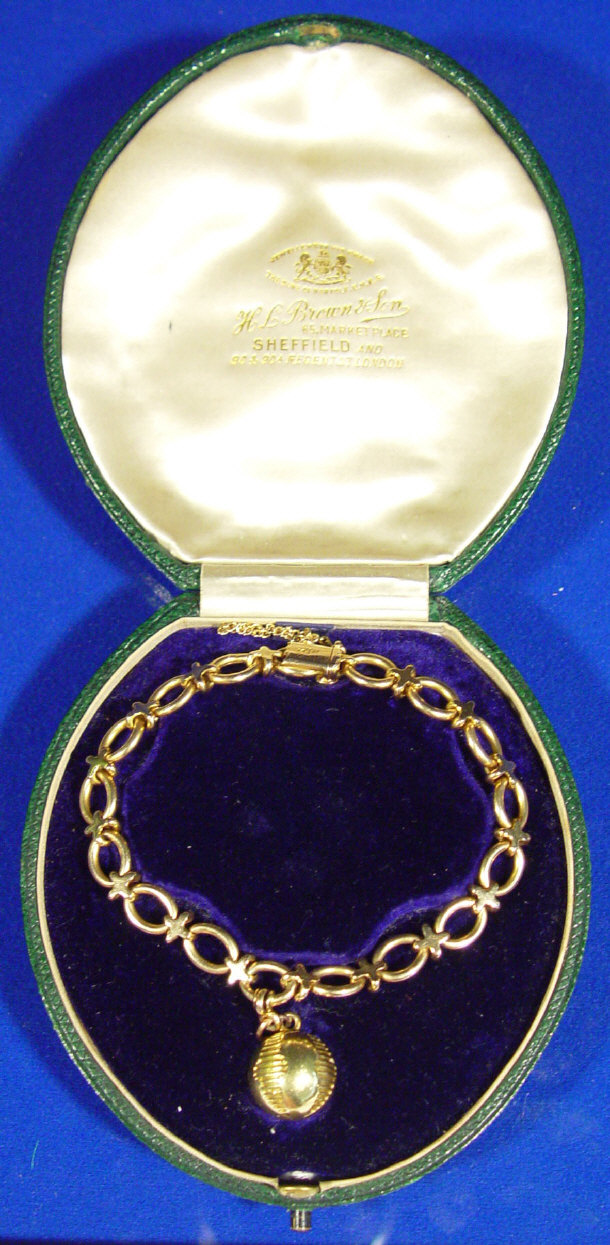 Appraisal: Boxed ct gold bracelet with gold bauble approximately gm