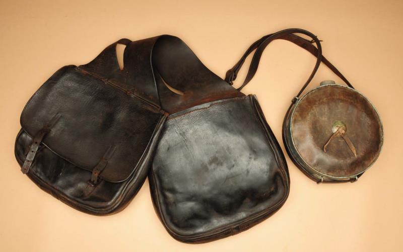 Appraisal: Lot of Saddle Bag Canteen One pair of th century