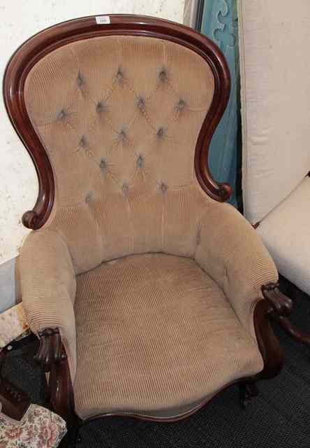 Appraisal: A VICTORIAN MAHOGANY ARMCHAIR with scroll back and arms serpentine