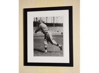 Appraisal: A framed black and white photograph of Babe Ruth with