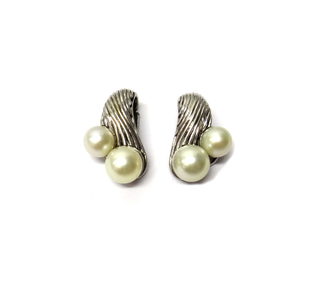 Appraisal: A pair of white gold and cultured pearl earclips each