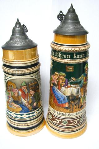 Appraisal: Two hinged lidded German drinking vessels including '' depicting dining