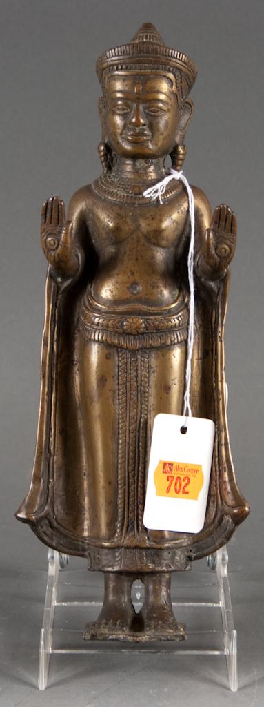 Appraisal: Khmer bronze figure of the Buddha standing th century or