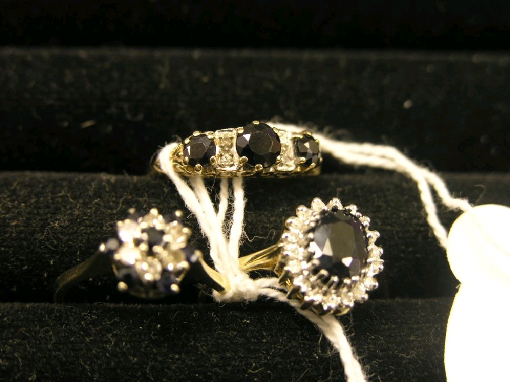 Appraisal: Three ct gold rings each set with white and blue