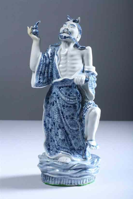 Appraisal: JAPANESE HIRADO BLUE AND WHITE PORCELAIN FIGURE OF MAN Meiji