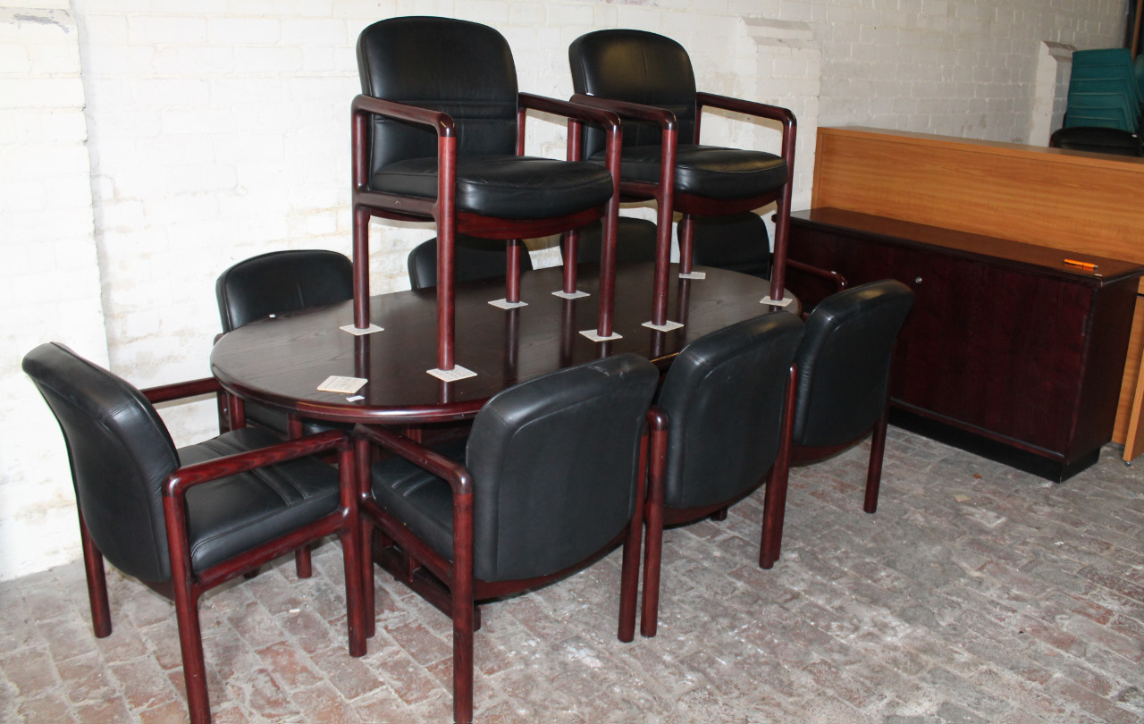 Appraisal: A cherry wood finish office suite comprising D-end boardroom table