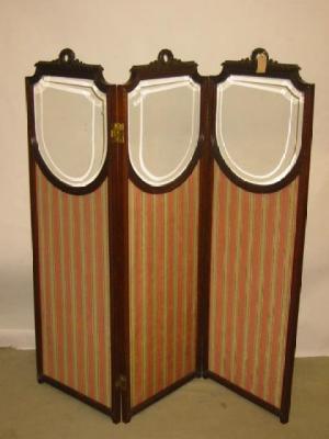 Appraisal: A MAHOGANY FOLDING SCREEN of oblong three fold form the