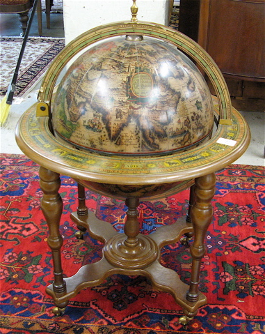 Appraisal: A LARGE WORLD FLOOR GLOBE BAR old world styling the