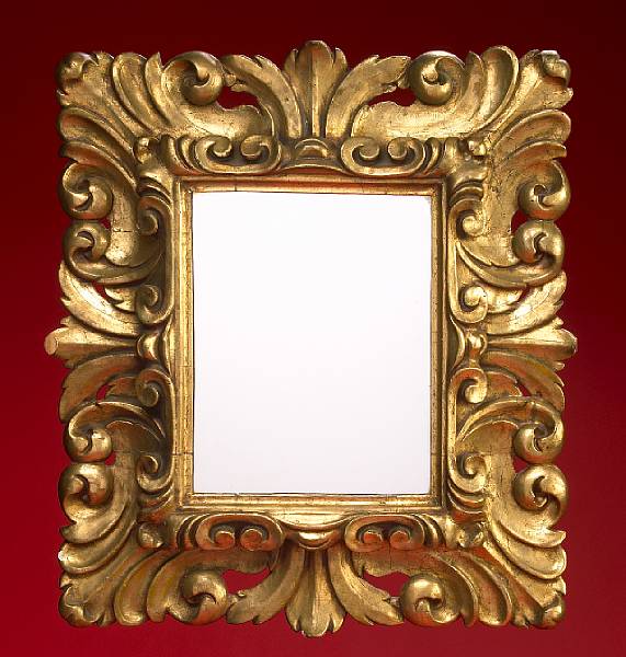 Appraisal: A Spanish carved and gilt decorated wall mirror height in