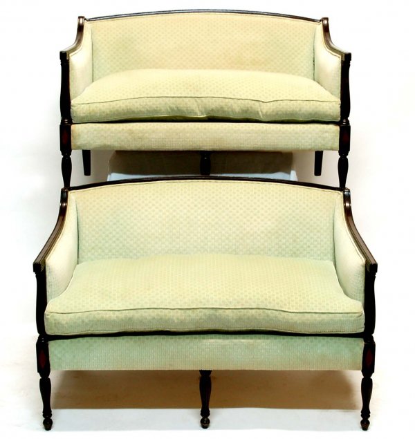 Appraisal: A pair of Georgian style settees Fluted arms and front