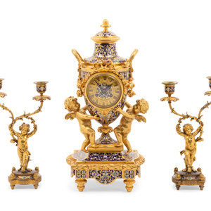 Appraisal: A French Gilt Bronze and Champlev Clock Garniture Retailed by