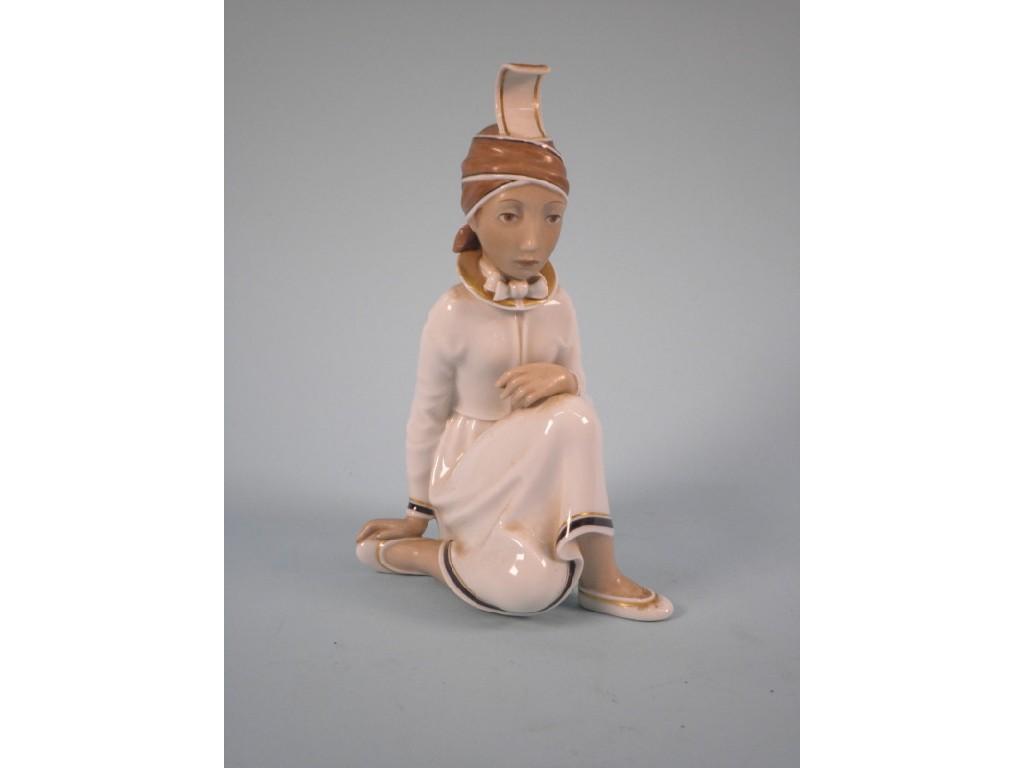 Appraisal: A Royal Copenhagen white and gold porcelain figure of an