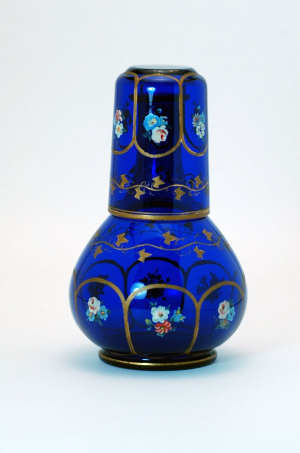 Appraisal: Bohemian cobalt blue decanter and tumbler with handpainted floral panels