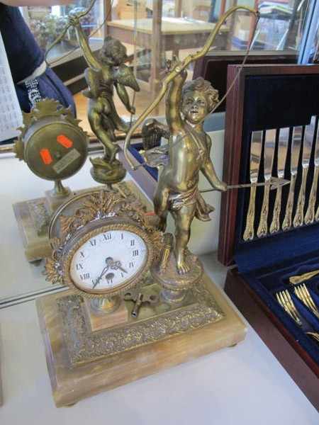 Appraisal: EARLY TH CENTURY GILT BRASS CUPID MANTEL CLOCK CONVERTED TO