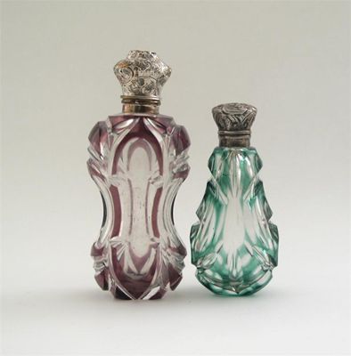 Appraisal: Two Victorian mounted glass scents with embossed hinged covers and