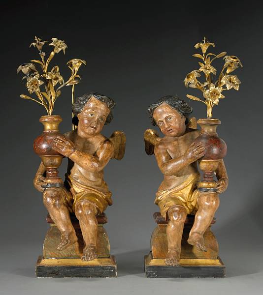 Appraisal: A pair of Italian Rococo painted and parcel gilt figural