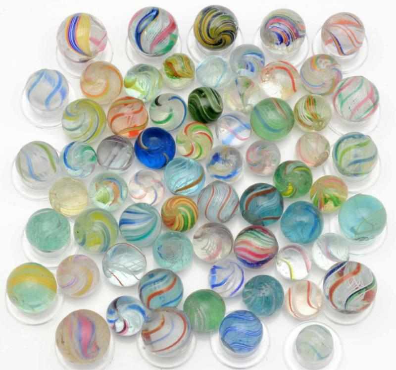 Appraisal: Lot of Handmade Marbles Includes divided core swirls latticino swirls