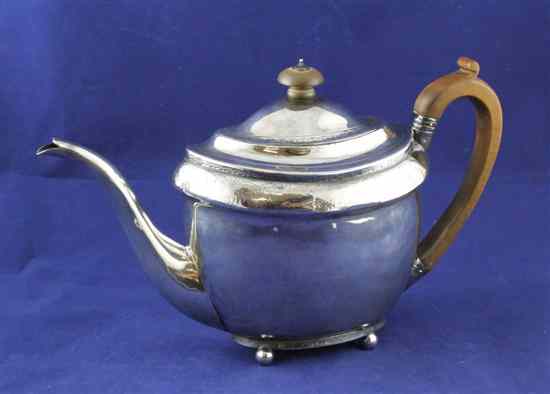 Appraisal: A George III silver teapot of oval form with engraved