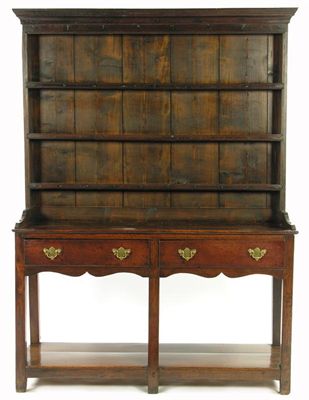 Appraisal: A South Wales oak dresser the plate rack with three